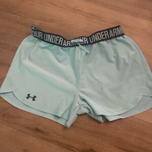 Under women’s light blue shorts, sz medium